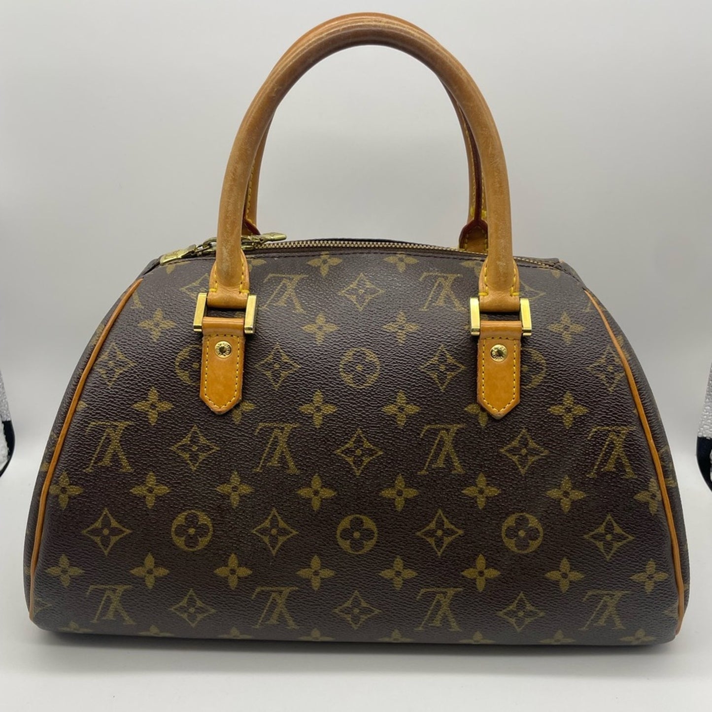SOLD! Louis Vuitton Monogram Ribera Hand Bag
