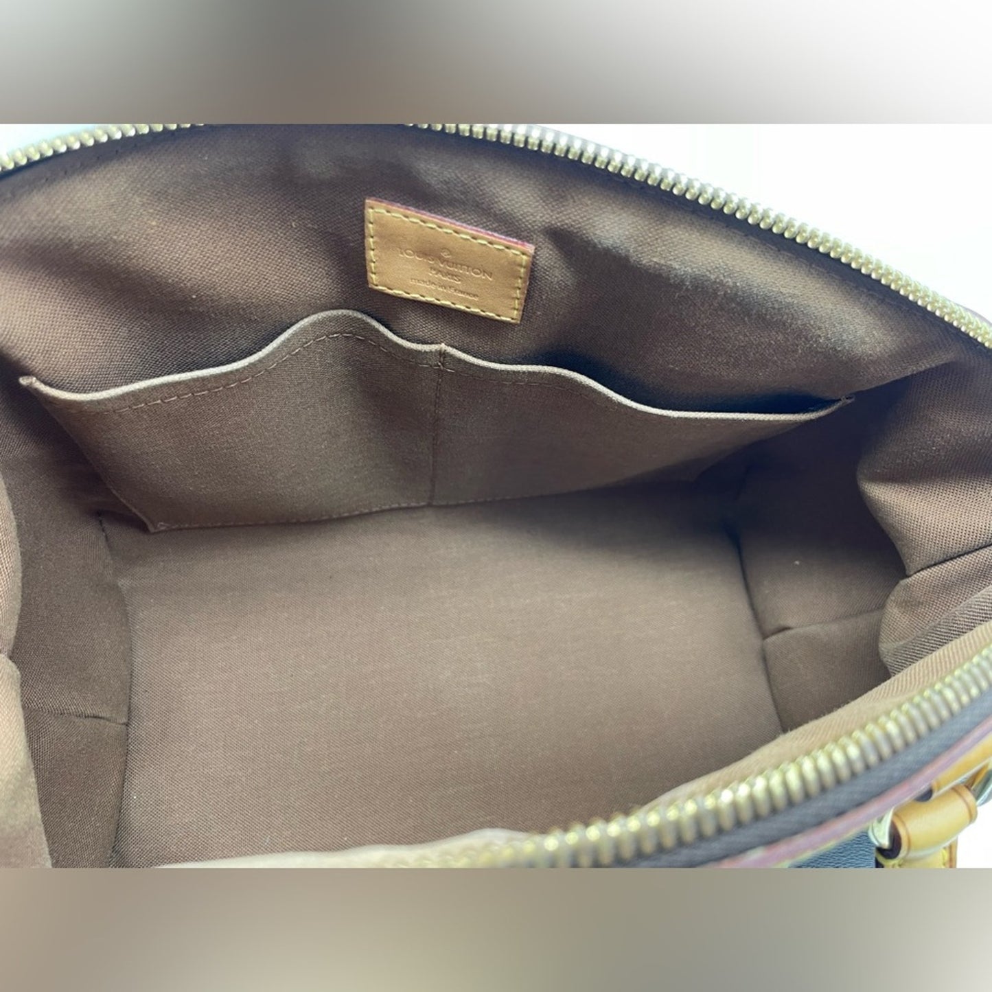 SOLD! Louis Vuitton Tivoli Monogram Handbag Bag