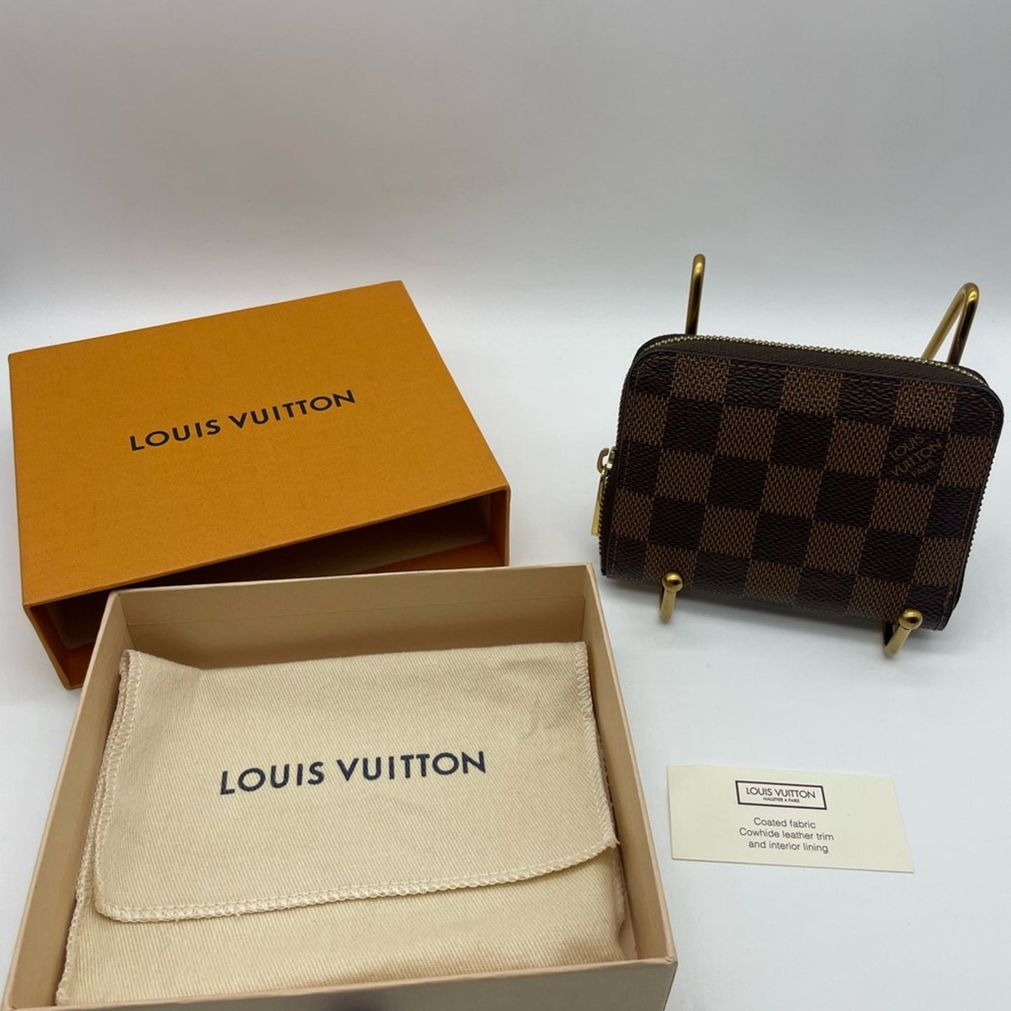 SOLD! Louis Vuitton Damier Ebene Zippy Wallet