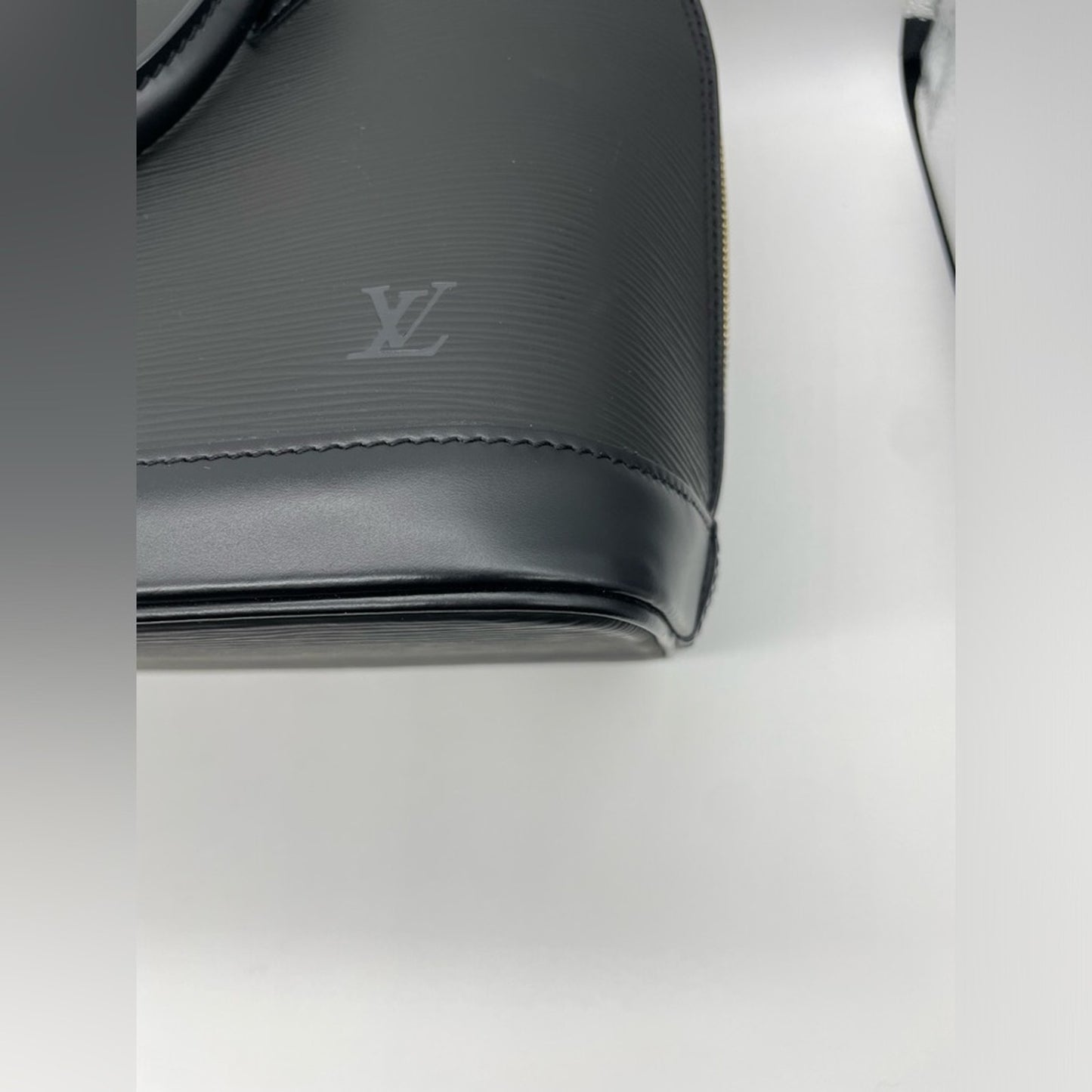 SOLD! Louis Vuitton Epi Alma Hand Bag
