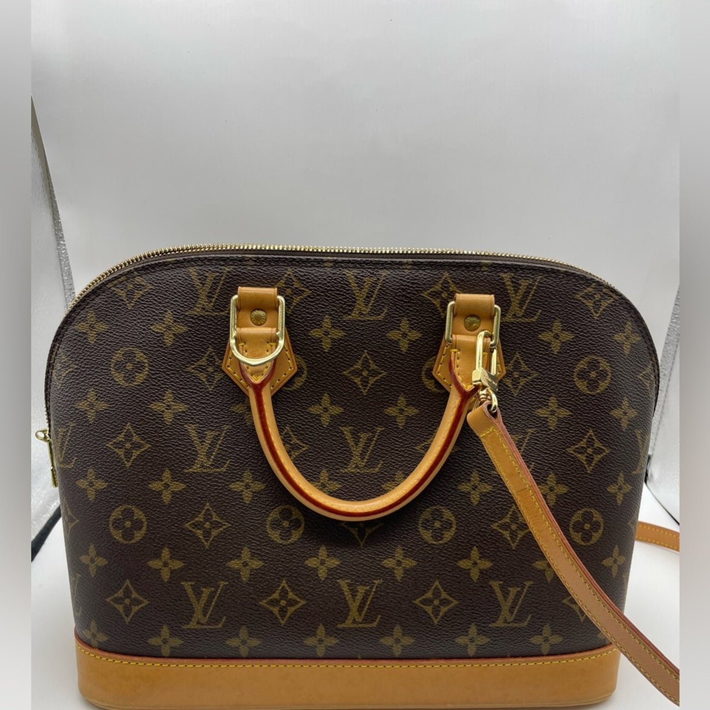 SOLD! Louis Vuitton Alma Monogram with LV Strap