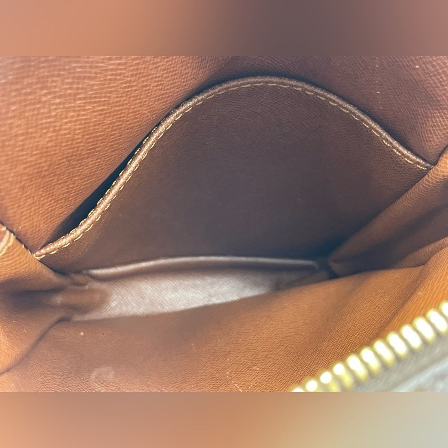 SOLD! Louis Vuitton Monogram Danube Sling Bag